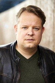 Roland Wolf as Mr. Reuter in Sun and Concrete 2023