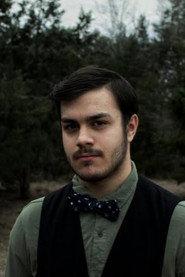 Caedmon Falls as Rick Corrino in Godzilla Ichor 2025