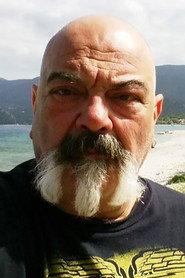 Steve Douzos as Bilias in Wheel Bag and Kopana 1982