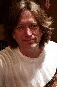 Bob Britt as Guitar, backing vocals in John Fogerty: The Long Road Home in Concert 2005