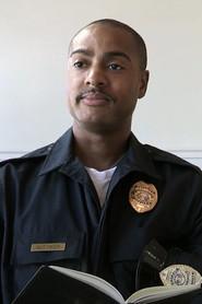 Anthony Walker as Police Officer in White Barber 2014