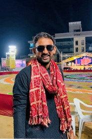 Raj Desai as Extra 2 in Memories 2023