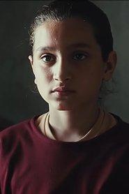 Baneen Ahmed Nayyef as Lamia in The President's Cake 2025