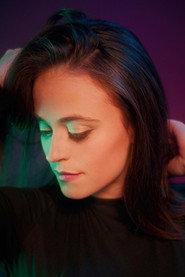 Maya Molly as Julie Anderson in The Ghost Knows 