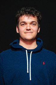 Toni Zamora as Sam in La Muerte Anunciada de un Villano