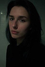 Milena Pasichnyk as Woman in The Other Side of Death 2026