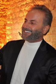 Ghassan Saliba as رئيس القافلة in Petra 1977