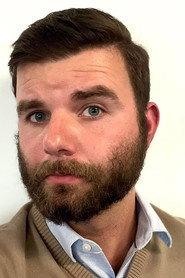 Ruben O' Neill as Prison Warden 2 in Brain Drain 2025