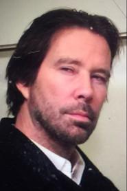 David Flynn as Lawrence in Proximity 2001