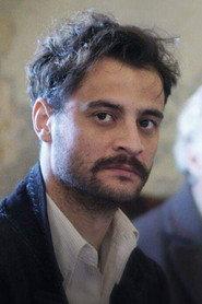 Aineias Tsamatis as Giannis (adult) in Giannis in the Cities 2024