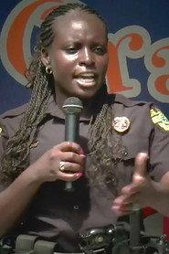 Debrah Clayton as Orlando Police Officer in Dueling Dragons 2017