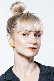 Katariina Libe as Journalist in New Money 2025