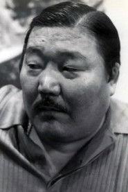 Iska Khan as Asian Client in Belle de Jour 1967