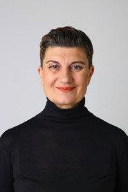 Natalya Medvedeva as Waiting Room Guest in Coffin Therapy 2026