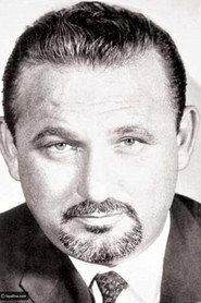 Ezz Eldin Zulficar as مستر جايمس in Port Said 1957
