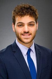 Charles Reisman as Charles Reisman in Welcome to the Family 2023