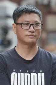Luo Zhigang as Chauffeur in Behind the Scenes 2003