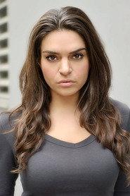 Mercedes De La Cruz as Melanie in Because You're Dead to Me 2022
