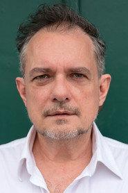 João Falcão as Padre in Luzia Homem 1988
