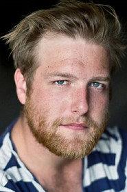 Götz Vogel von Vogelstein as Texel's Stepfather in A Perfect Enemy 2021