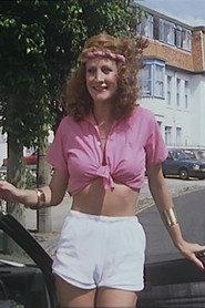 Rikki Howard as Miss Drysdale in Girls Come First 1975