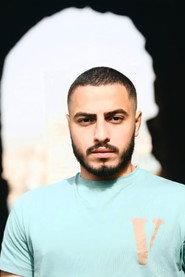 Ali Mortada as Man in black in DRBALC 2022