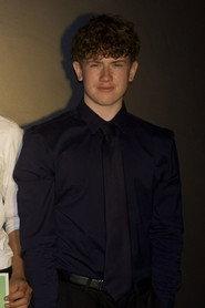 Will Brownlow as Poppy's Brother in Simulacrum 2027