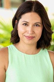 Elvia Hill as Reporter in True Love Blooms 2019