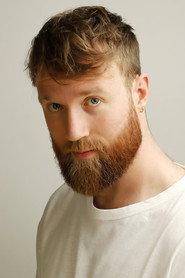 Tom Penn as Ronnie Triumph in The Present Times