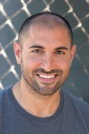 Danny Jacobs as King Julien (voice) in Penguins of Madagascar 2014