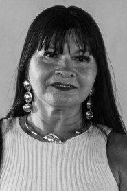 Ely Negrão as Mulher Bêbada in No Name, No Address 2026