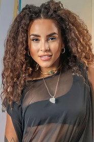 Domitila Barros as Indira in The Peacock 2023