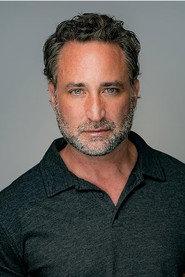 Billy Joseph Jr. as Bench pretender three/ Outdoor restaurant waiter in Like and Subscribe