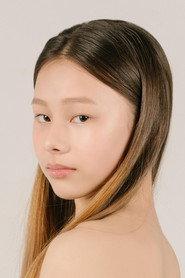 Liza Wai as young girl in A Silenced Lament 2025
