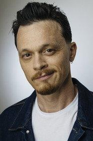 Skylar T. Adams as Adama in Corpse Run 2008