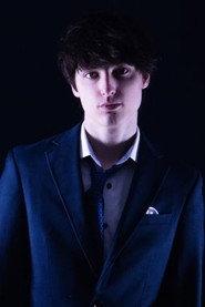 Sam Wlezien as Bill Casey in Student at Law 2025