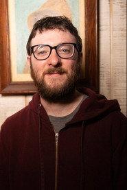Tom Achilles as Tom in Ditched 2024