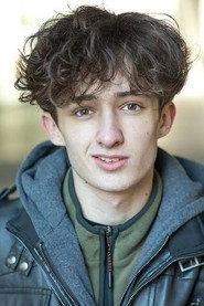 Ilirian Bushi as Simon Fowler in The Subordinate 