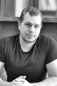Rob Gilchrist as Stranded Passenger in What Happens Later 2023