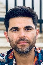 Meir Tamam as Asi Kadosh in Running on Sand 2023