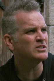 Eric R. Williams as Happy in A Waste of Time 2022