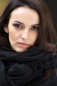 Yuliya Zimina as Music Professor in Young Girls in Black 2010