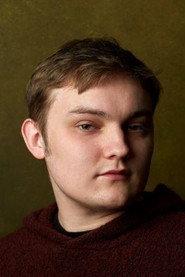 Benjamin Hillyer as Dezzer Crimple in The Satan Cube 2022
