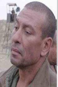 Ahmed Rezzak as Amar Ouamrane in Krim Belkacem 2014