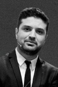 Miguel Maldonado as The Organizer in The City 1999