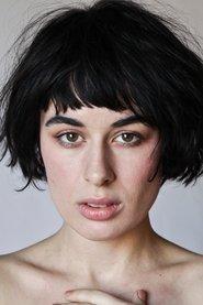 Olive Glass as Mad Maxine in Mad Maxine: Frisky Road 2018