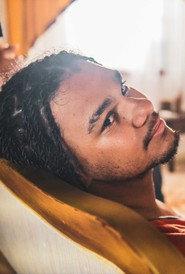 Cainã Malê as Léo in While the Rain Falls 2026