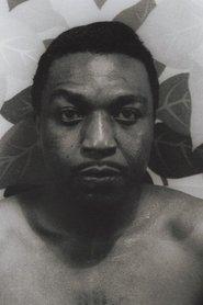 Dots Johnson as (archive footage) in Rossellini and the City 2009