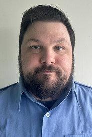 Mathieu Lamarche as Security Guard (Gary Gagnon) in Greed & Gore 