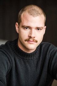 Hugo Pires as Gustave in Anyway, I Piss Sitting Down 2025